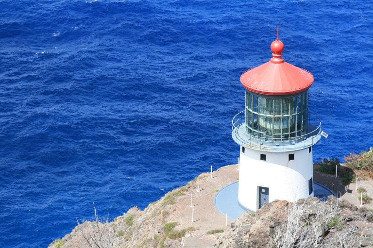 Iconic Makapu'u Point Lighthouse stands tall on the Makapu'u Point Lighthouse Trail in Oahu.