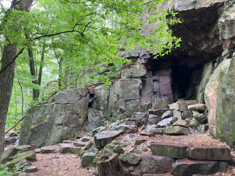 The Elephant Cave formation at Devil's Lake State Park's East Bluff Trail in Wisconsin, a dark op