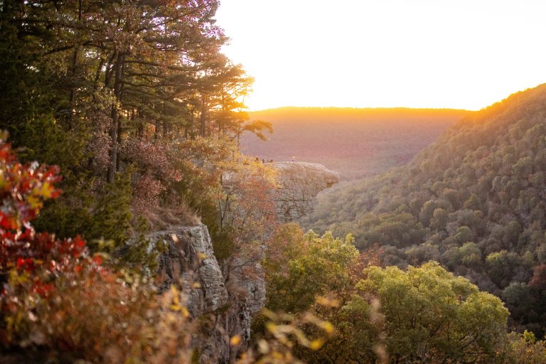 Golden hour light on iconic Hawksbill Crag from Whitaker Point Trail.